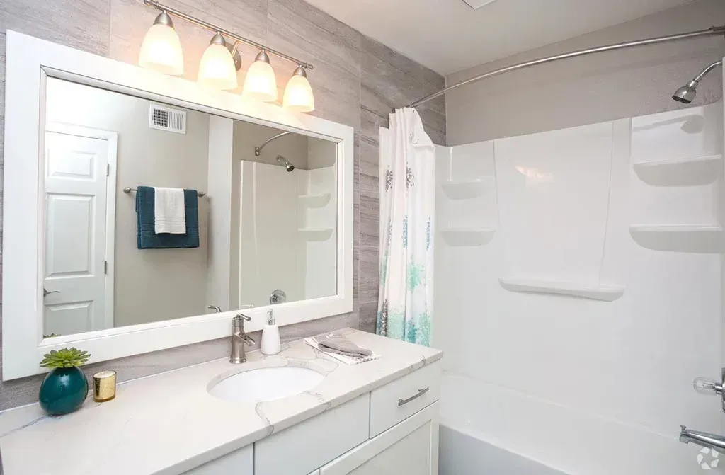 Updated bathroom vanity and shower at 2100 Defoors apartment in Atlanta GA