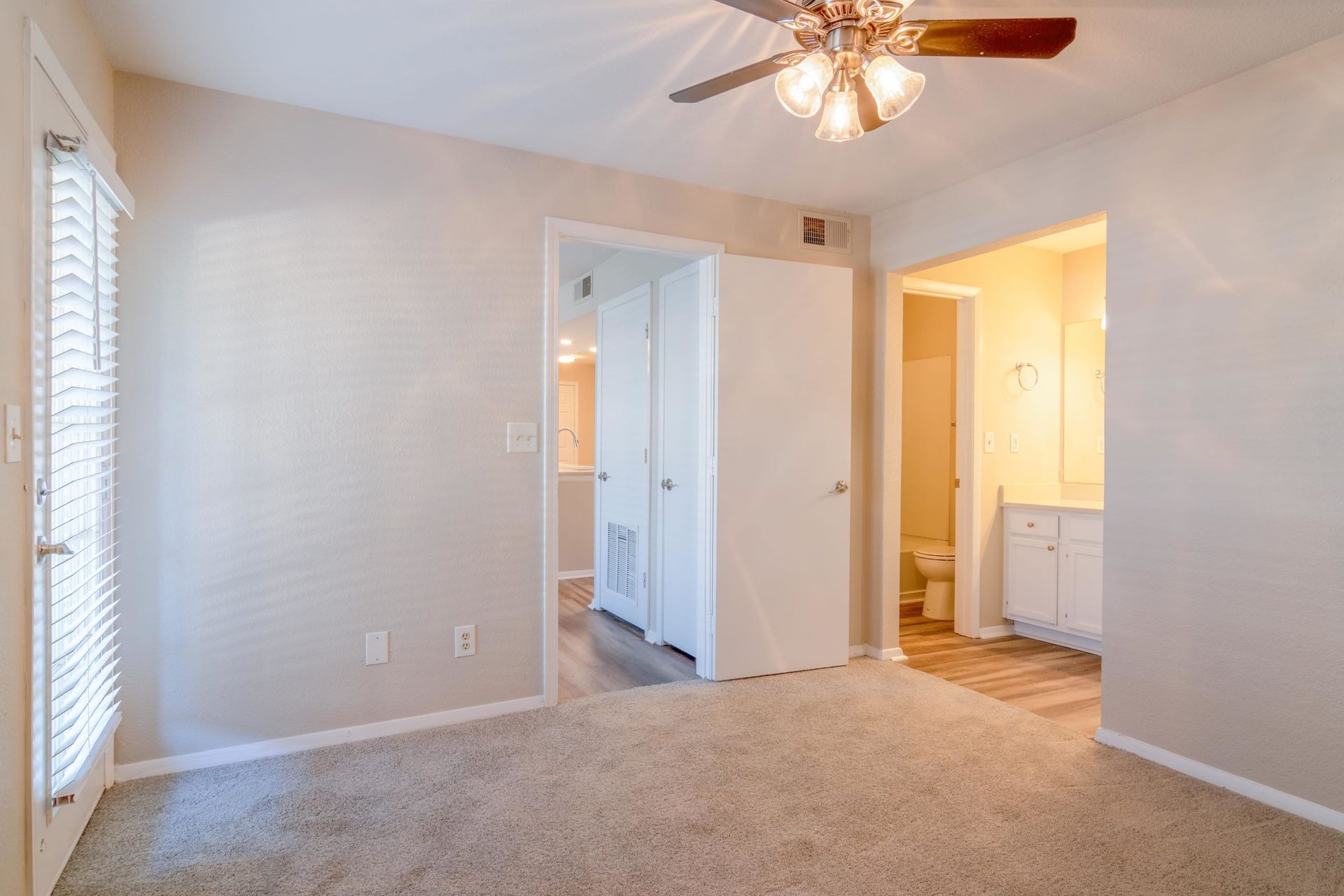 Spacious bedroom with en suite bathroom at 2100 Defoors Atlanta apartment