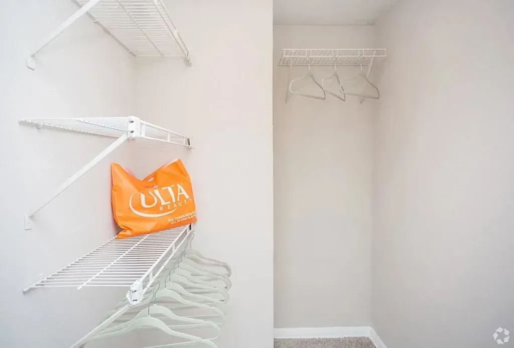 Walk-in closet with shelving at 2100 Defoors apartment in Atlanta GA