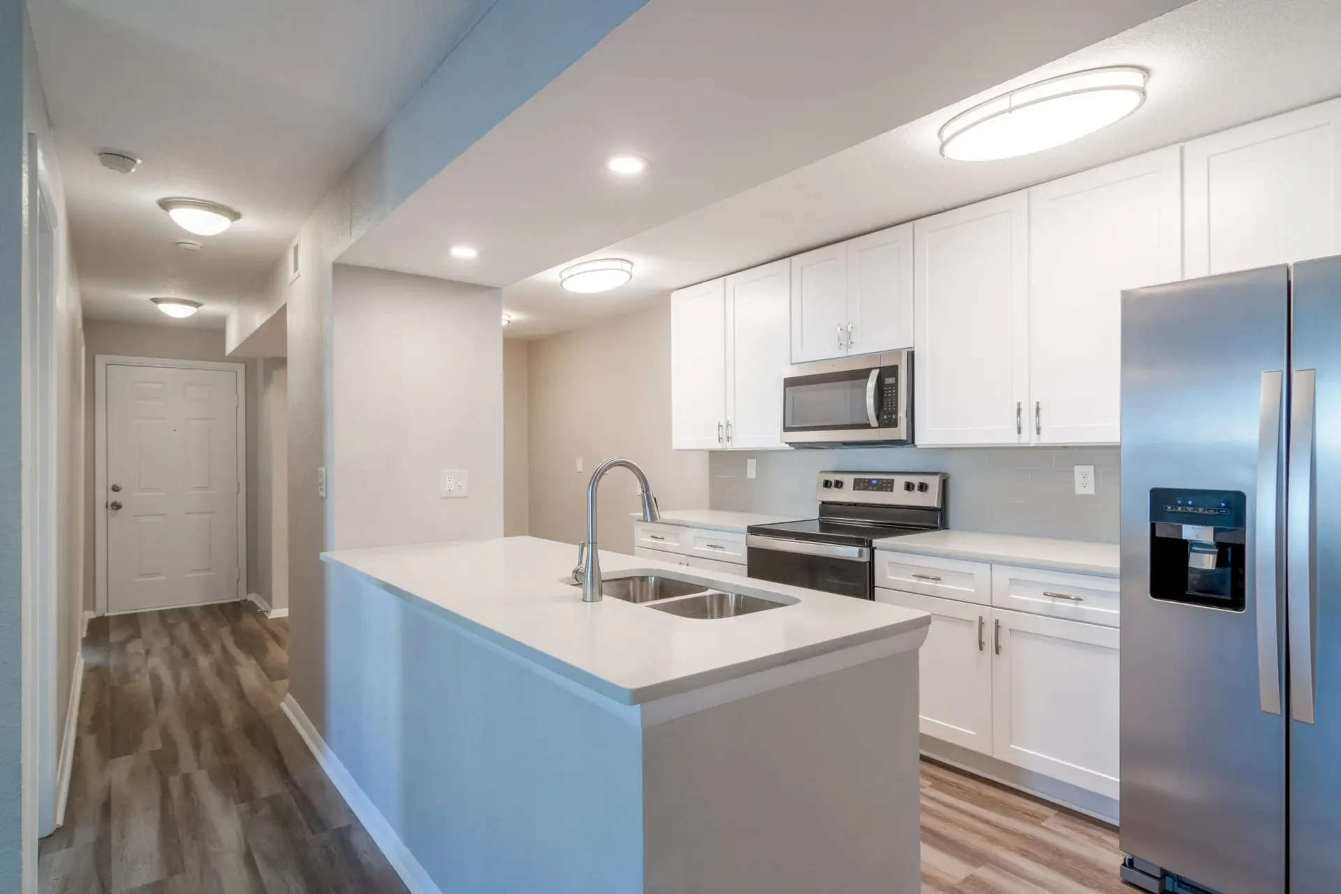 Apartment kitchen with modern finishes at 2100 Defoors