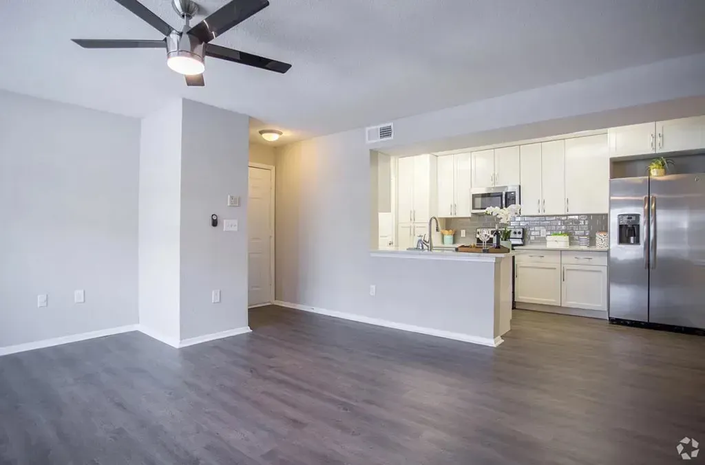 Open concept living room and kitchen at 2100 Defoors apartments in West Midtown Atlanta, GA