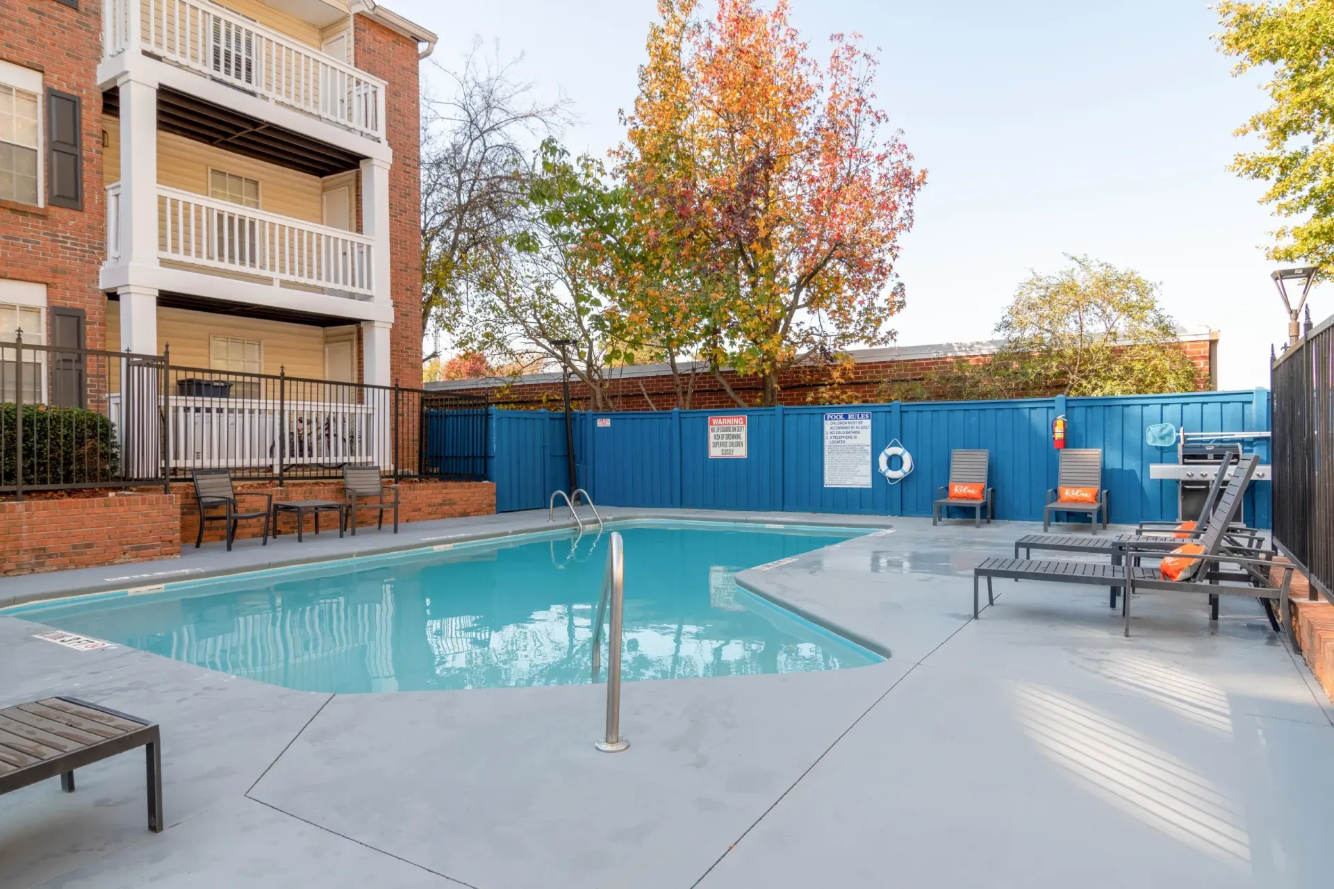 Community pool and lounge seating at 2100 Defoors Westside Atlanta