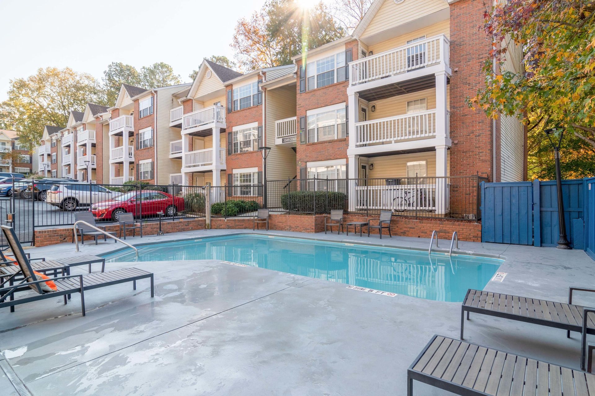 Resort-style swimming pool at 2100 Defoors apartments in West Midtown Atlanta