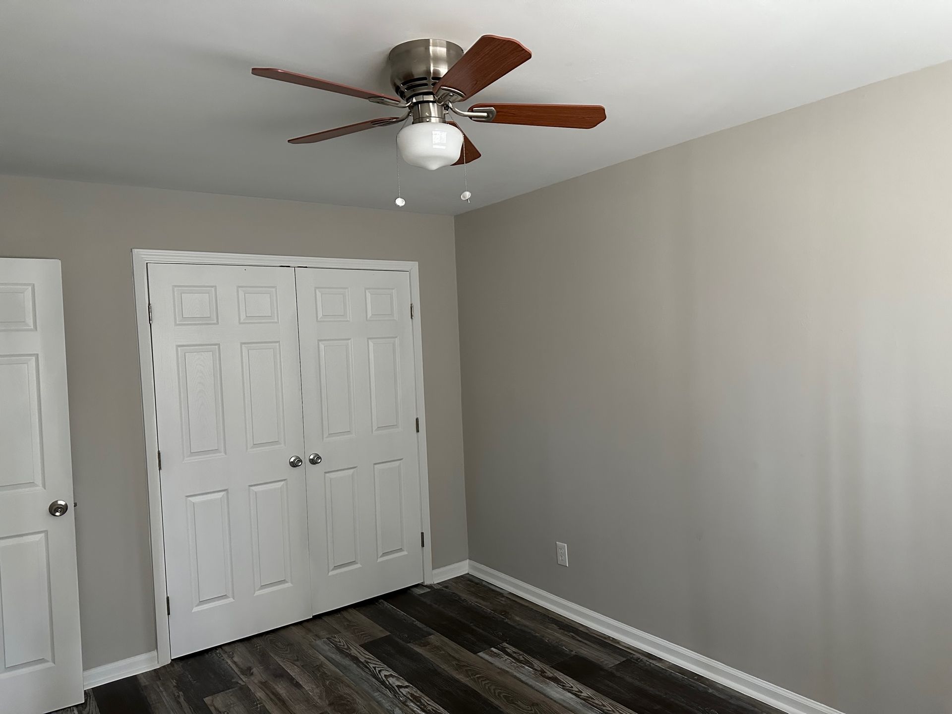 Bedroom with ceiling fan at Monteleone apartments in Atlanta