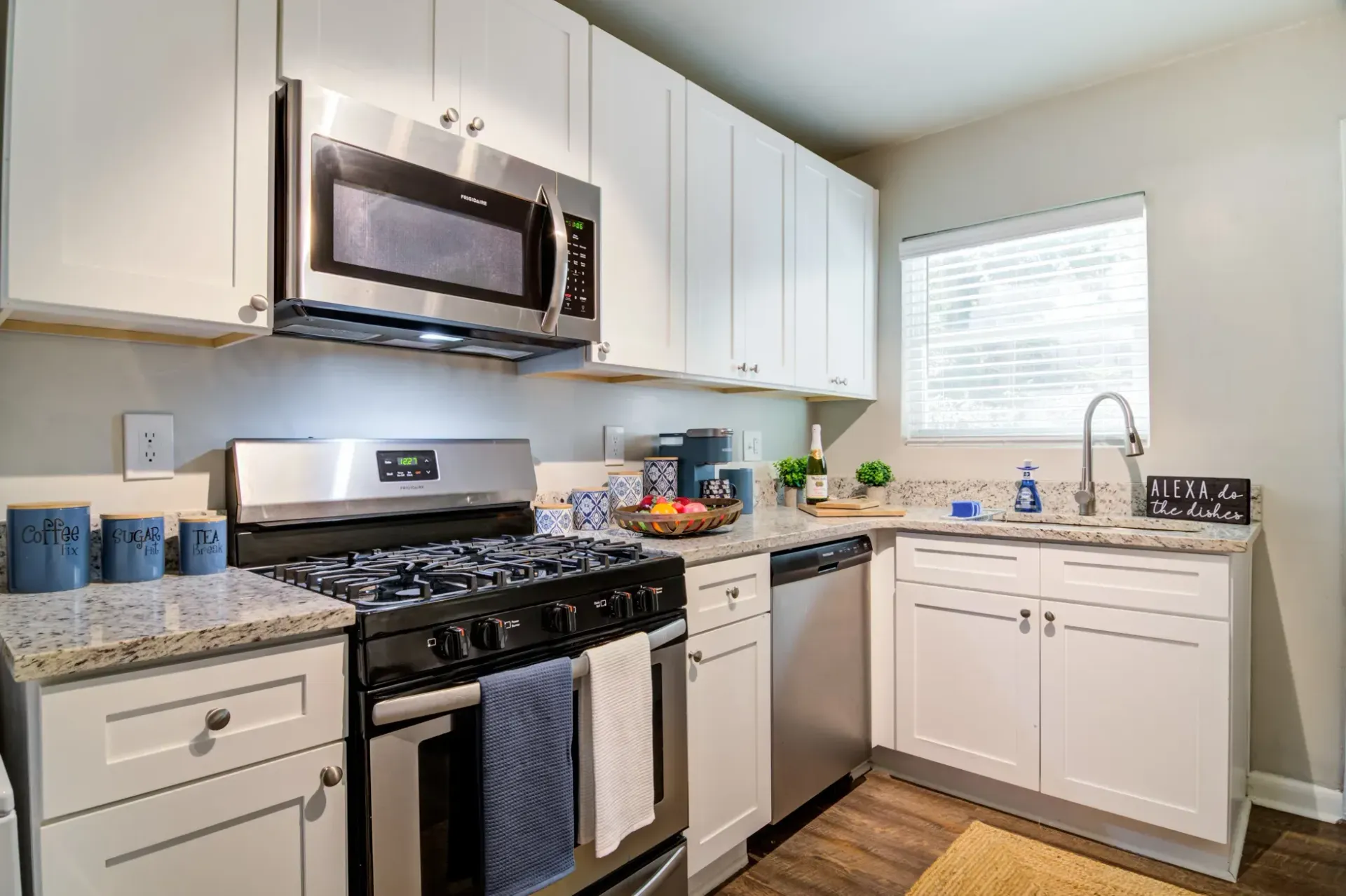 Updated kitchen with granite countertops at Collier Flats in Atlanta GA