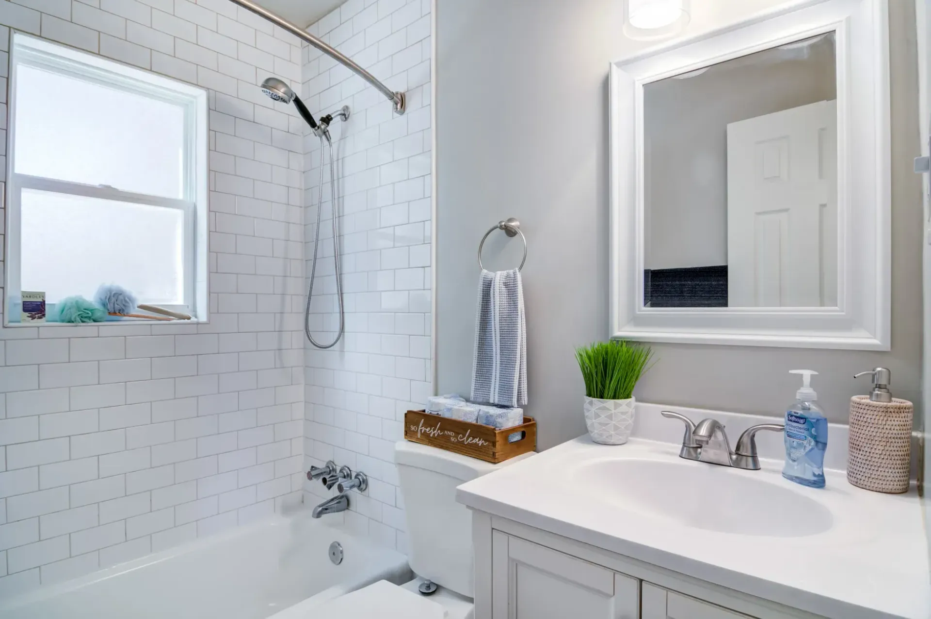 Updated bathroom with tiled shower at Collier Flats apartment