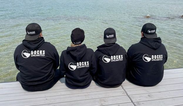 Docks Unlimited - Join Our Team The Docks Unlimited crew smiling on site