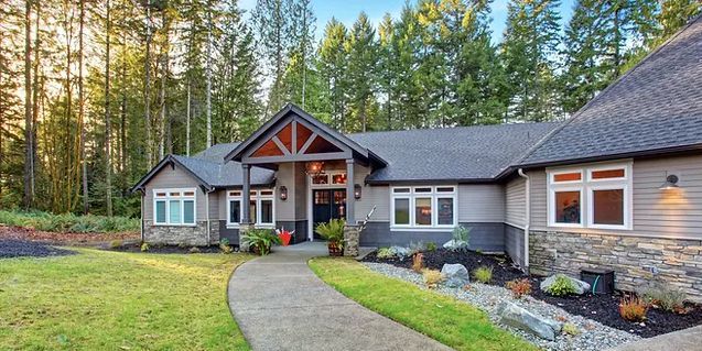 An image of a beautiful home with forest scene background