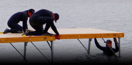 Docks Unlimited - Removals Dock removal crew dismantling and removing the dock structure with precision and expertise