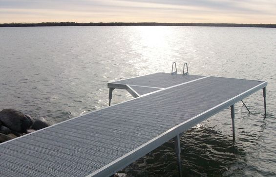A standard duty pipe dock leading onto the water