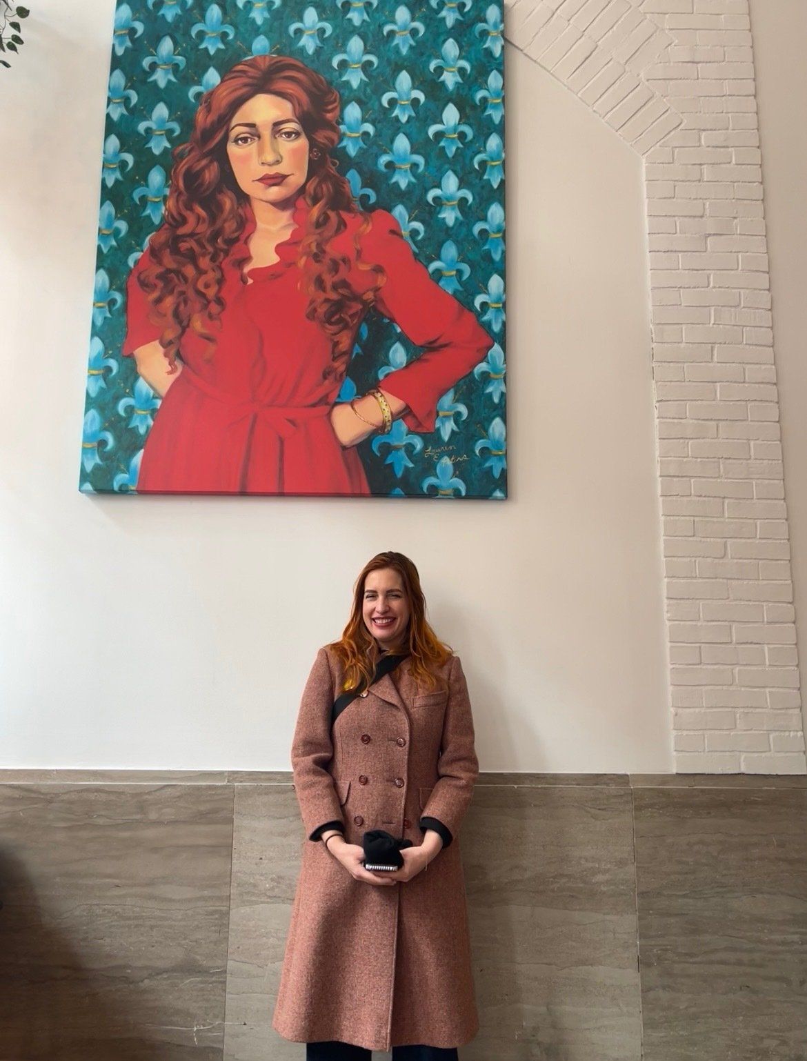 artist with her portrait of Wilma in Wilmington, Delaware