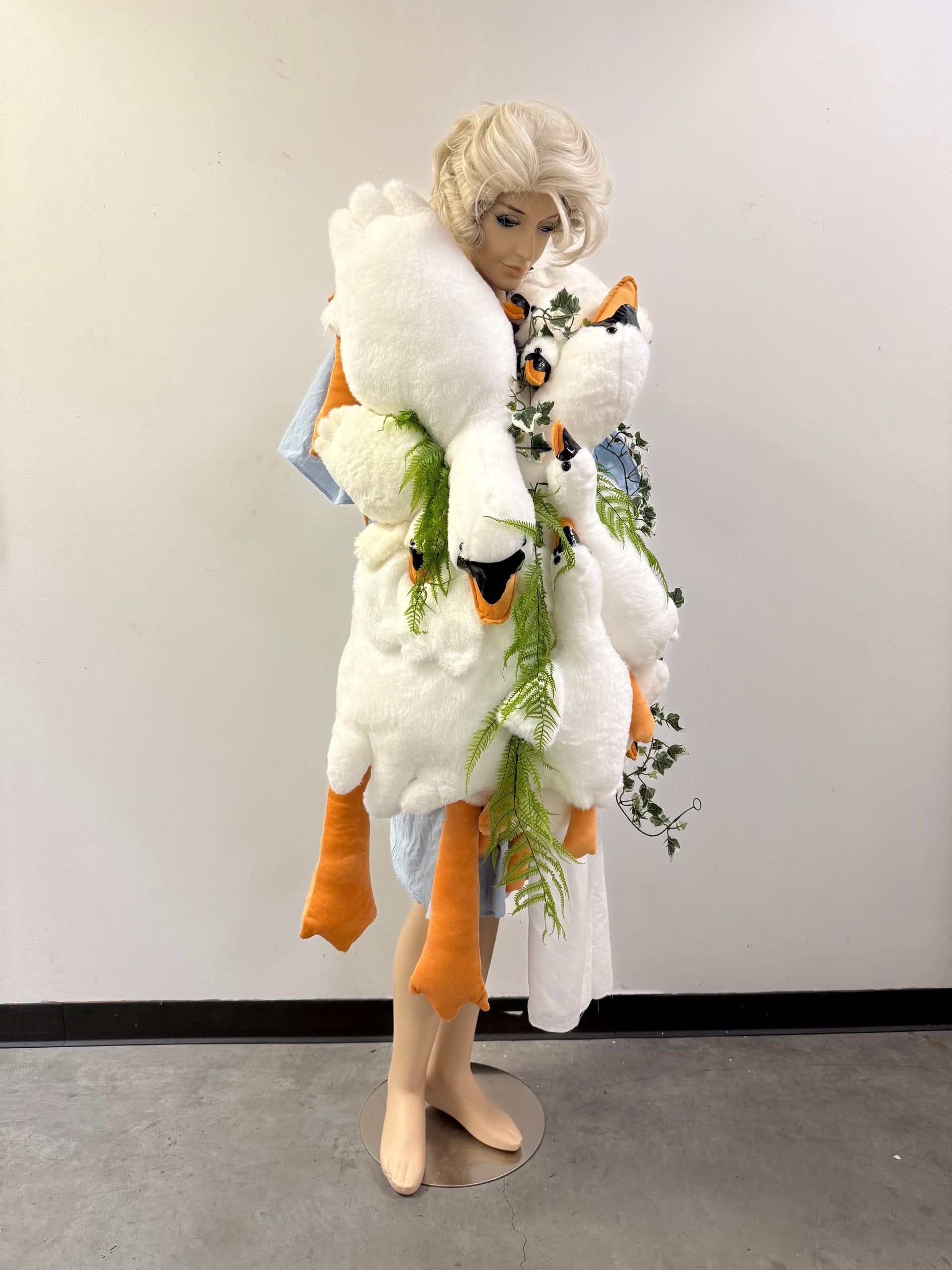 dress made out of swan stuffed animals