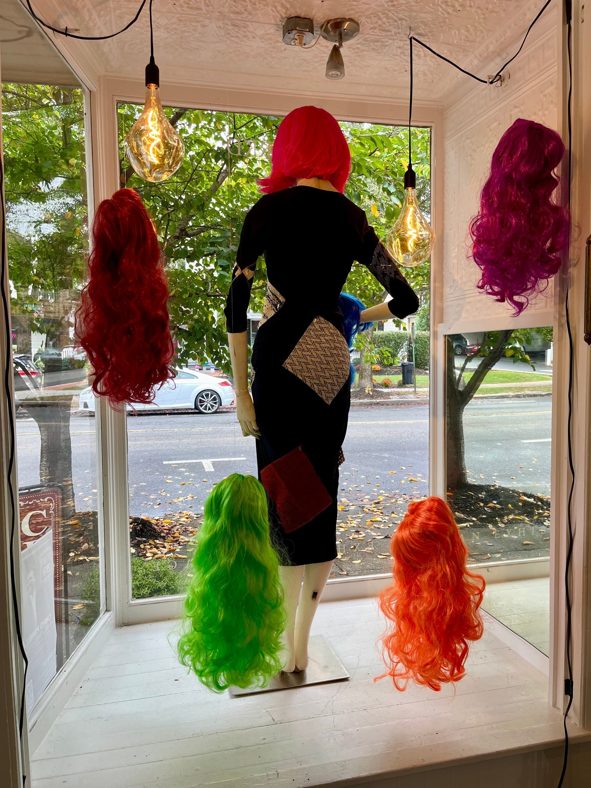 window display with wigs for 