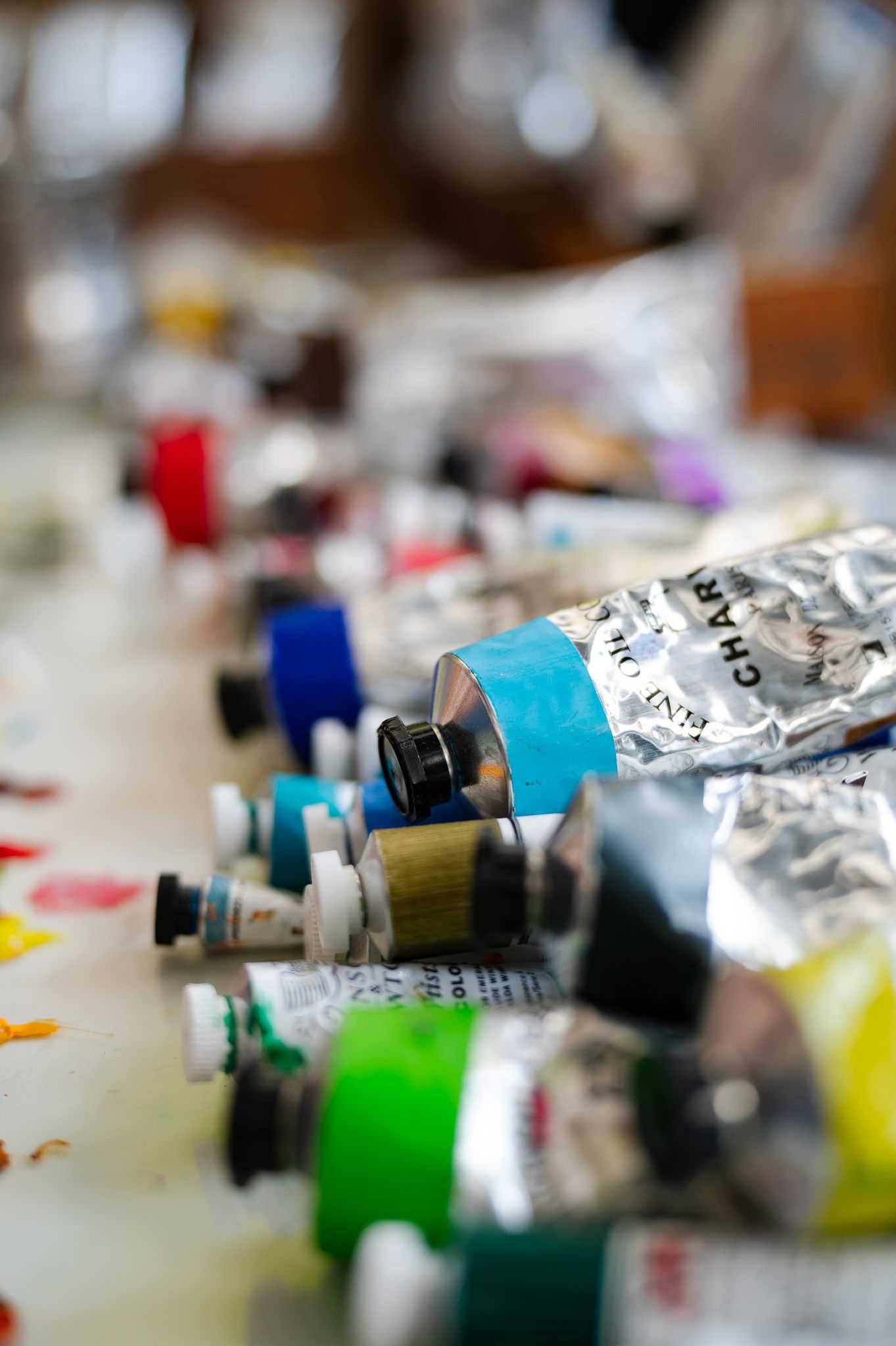 tubes of paint stacked up on a palette