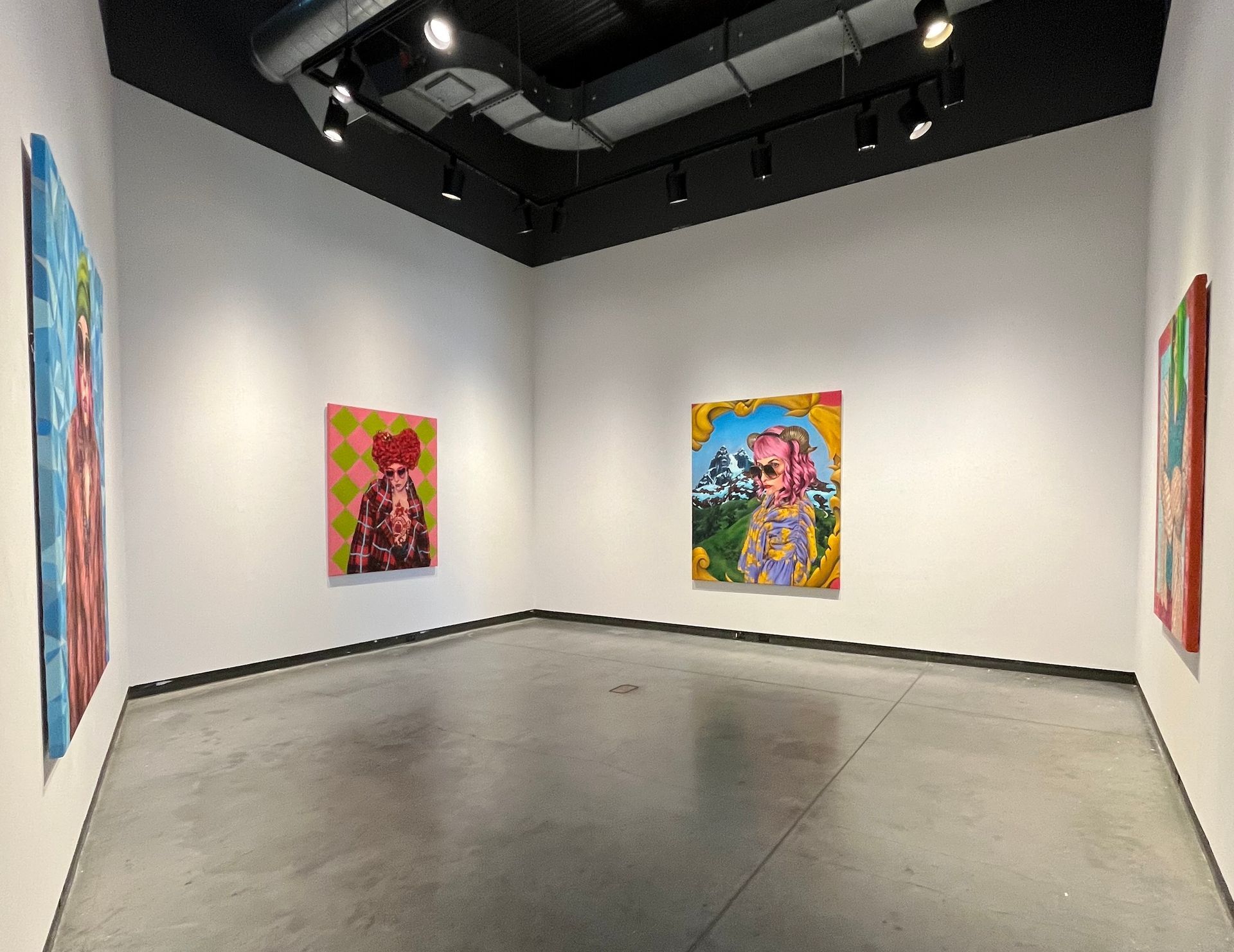 Interior of an art gallery with large paintings, one per wall, The Delaware Contemporary 2023