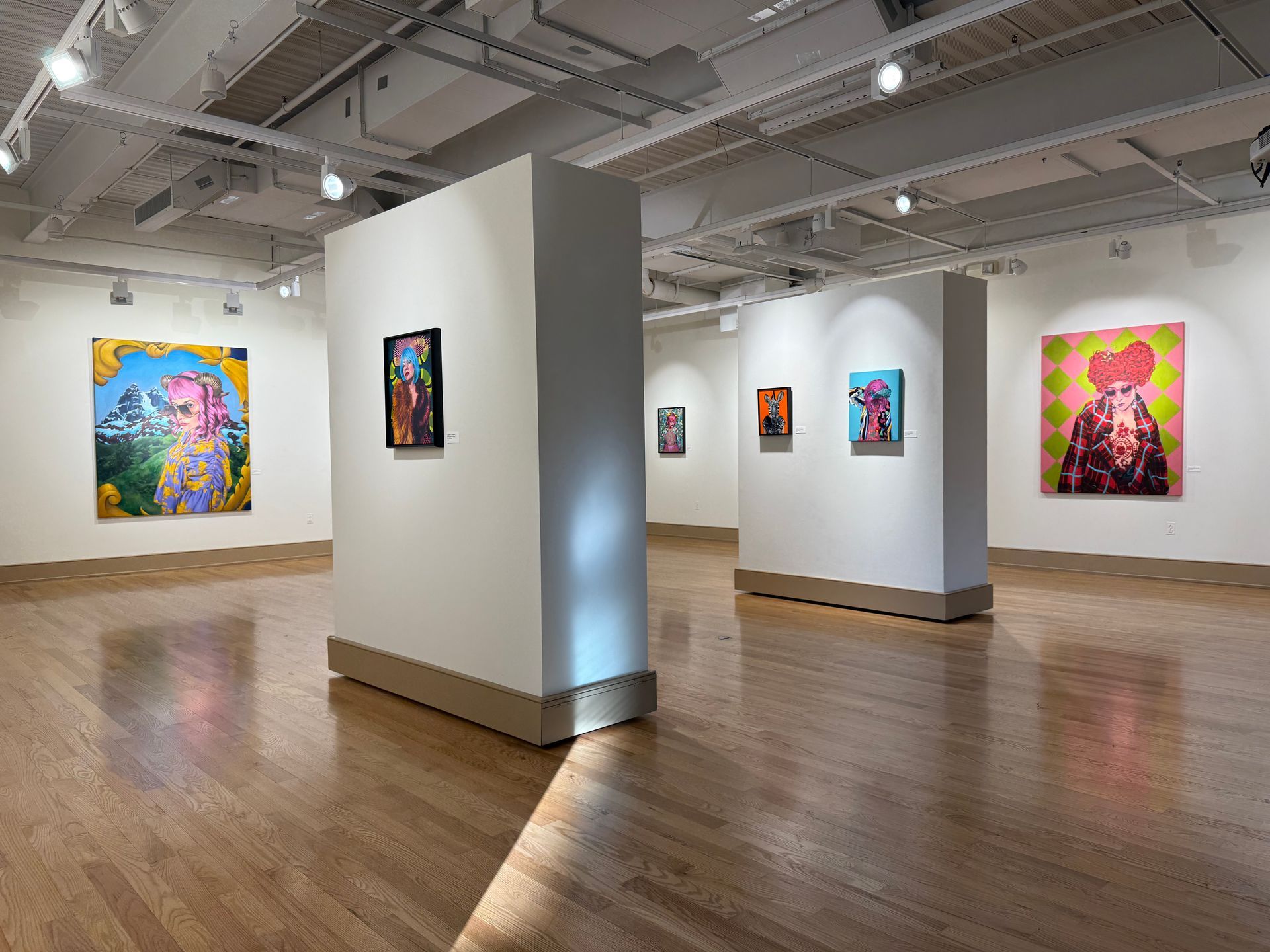 Interior of an art gallery with paintings, 2024