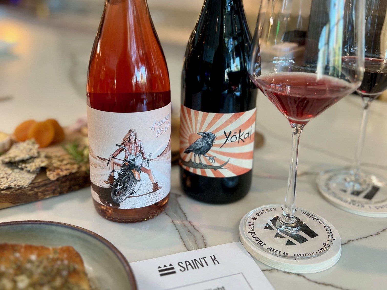 Saint K Around the Way rosé and Yōkai with a poured glass, cheese board, and focaccia at Gravesend in Paso Robles
