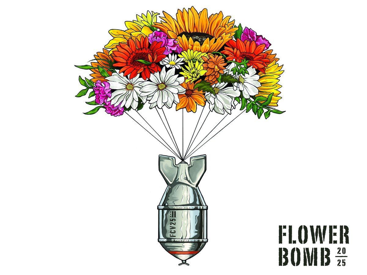 Bouquet of colorful flowers arranged in a metal bomb-shaped vase with the text “FLOWER BOMB.”