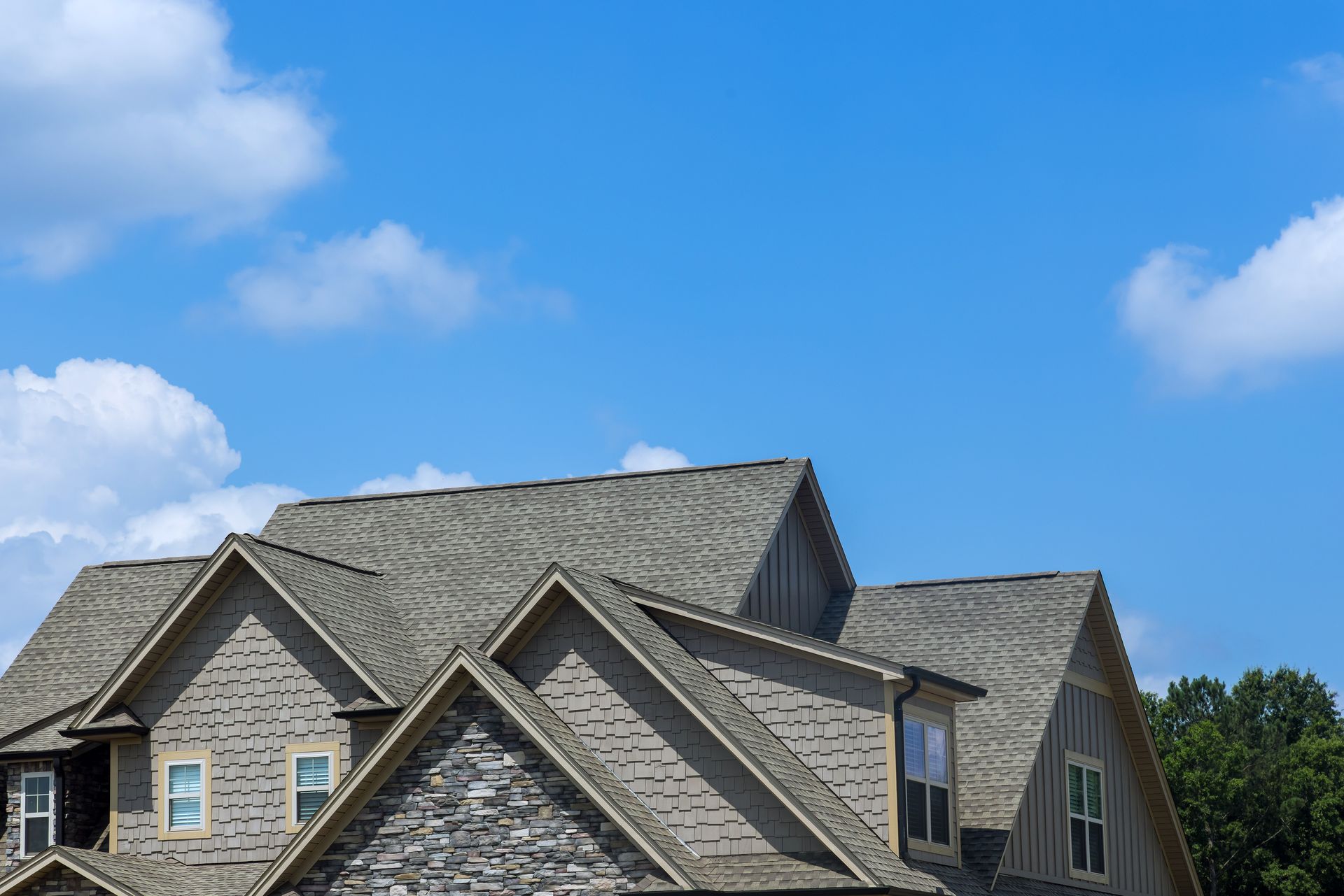 New asphalt roof installation house.