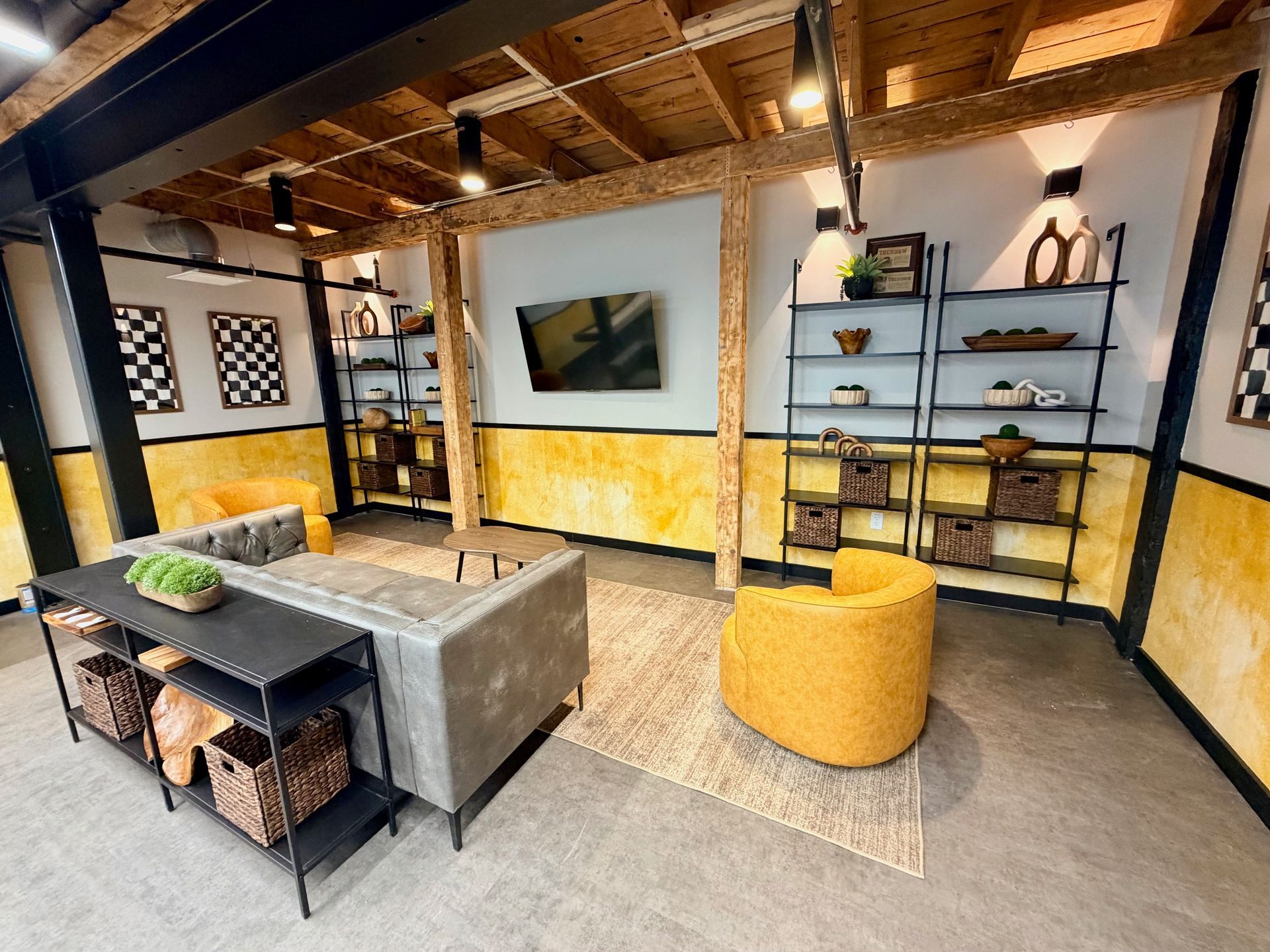 A curated resident lounge at The Reeds, a boutique apartment community in Worcester, MA