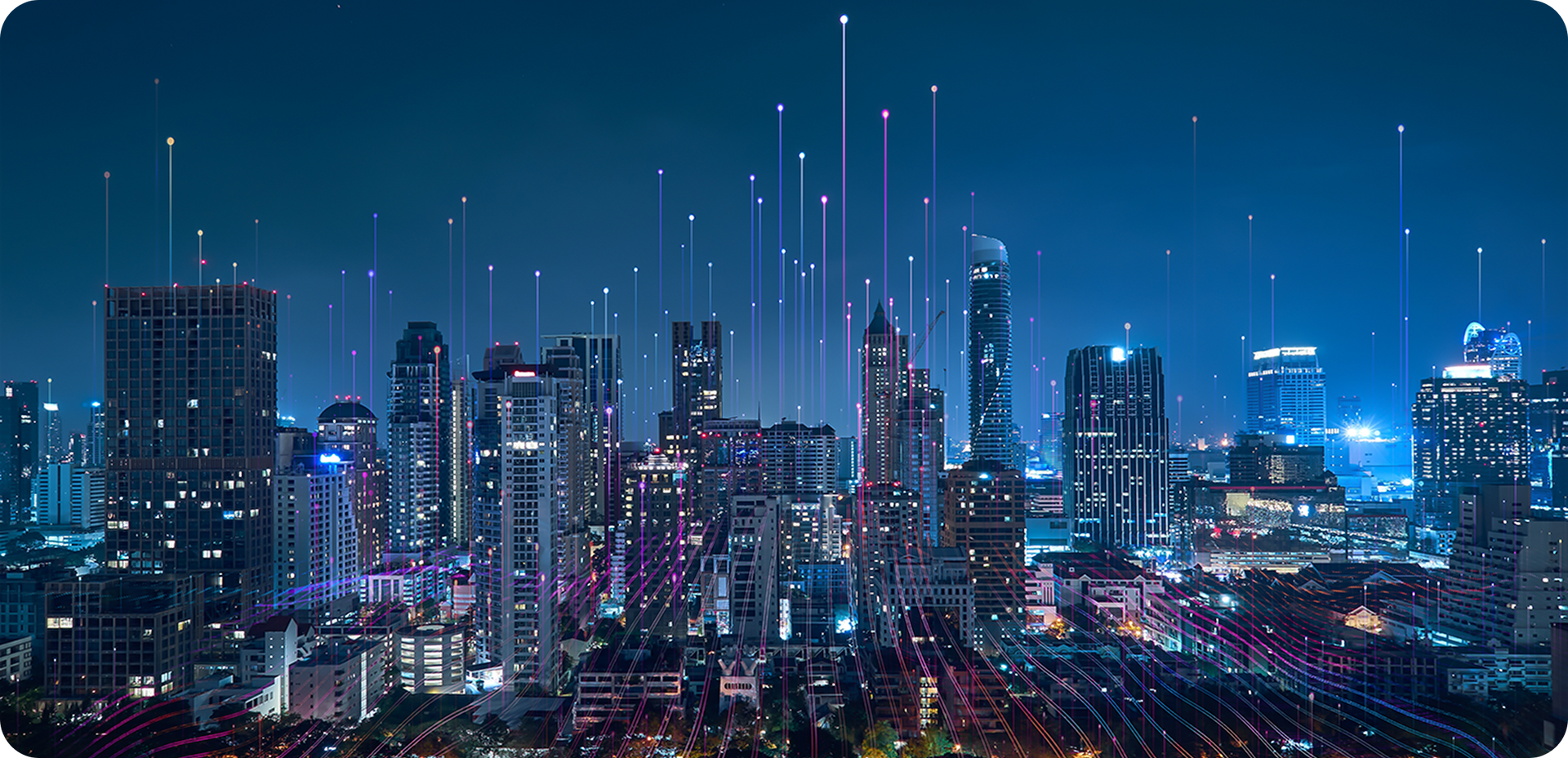 A nighttime cityscape with glowing lights, interconnected by vertical lines, under a dark blue sky. A nighttime cityscape with glowing lights, interconnected by vertical lines, under a dark blue sky.