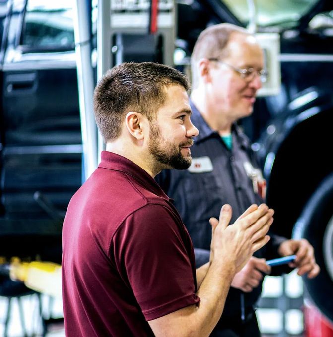 Lancer Service Owner Talking With Team Members | Lancer Service