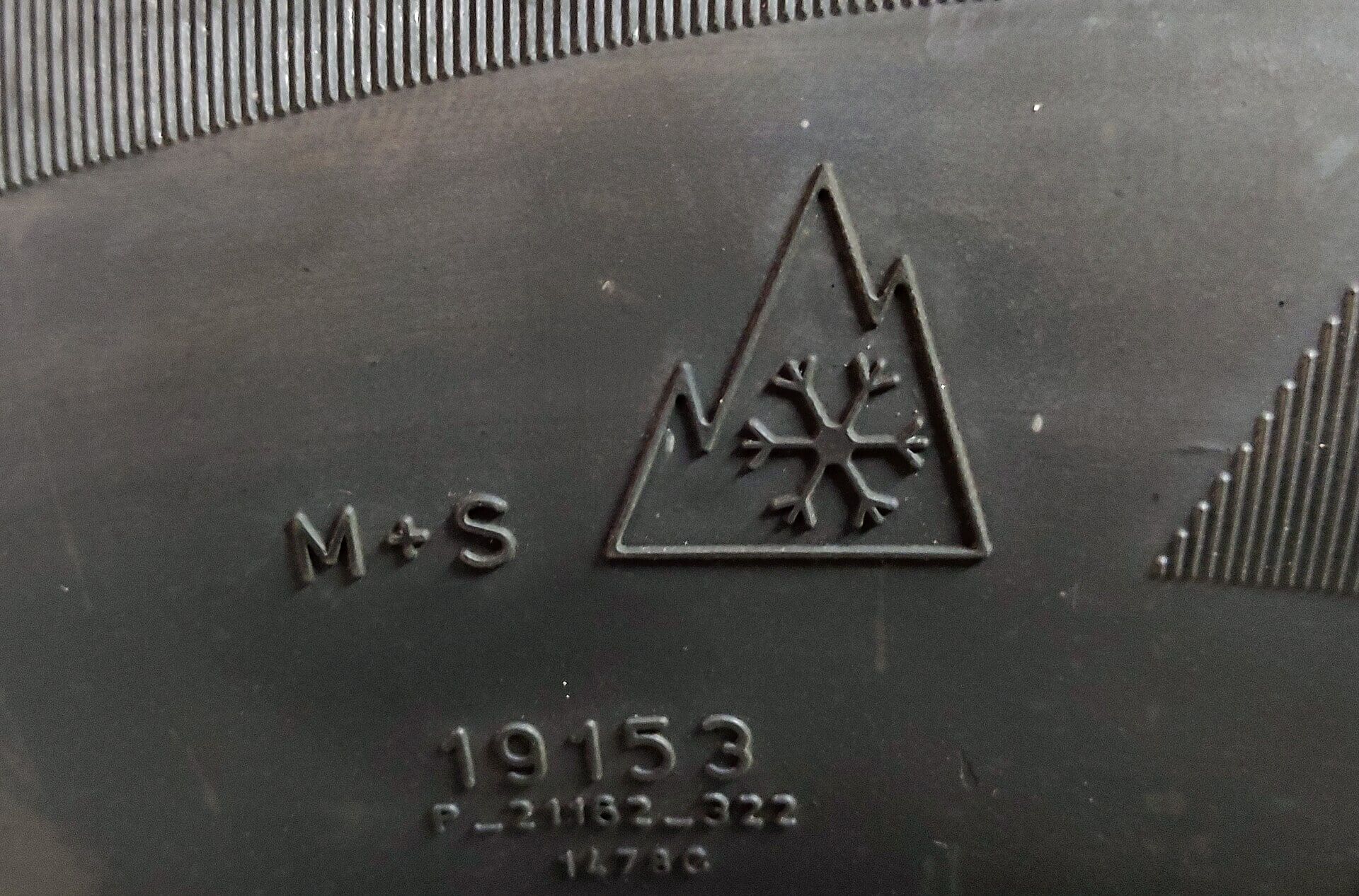 Close-up picture of the snowflake and M+S emblems.