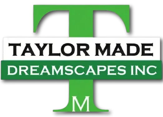 Taylor Made Dreamscapes Inc logo with green and white stylized T and M