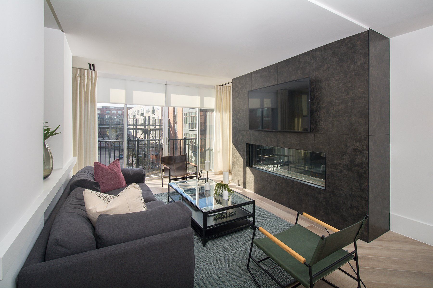 Lobby with large fireplace and TV