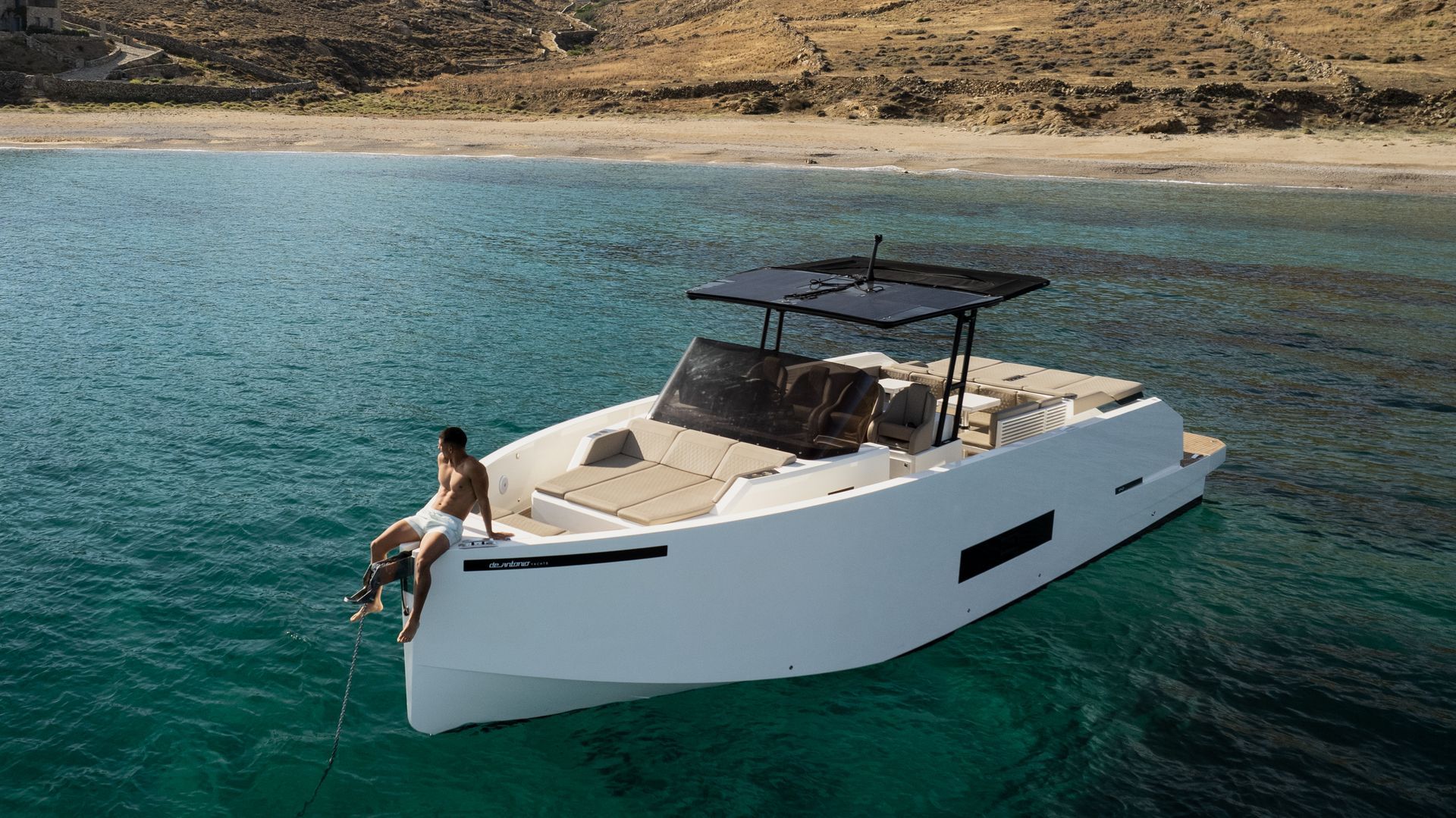 Luxury private yacht in Mykonos cruising along Rhenia Island