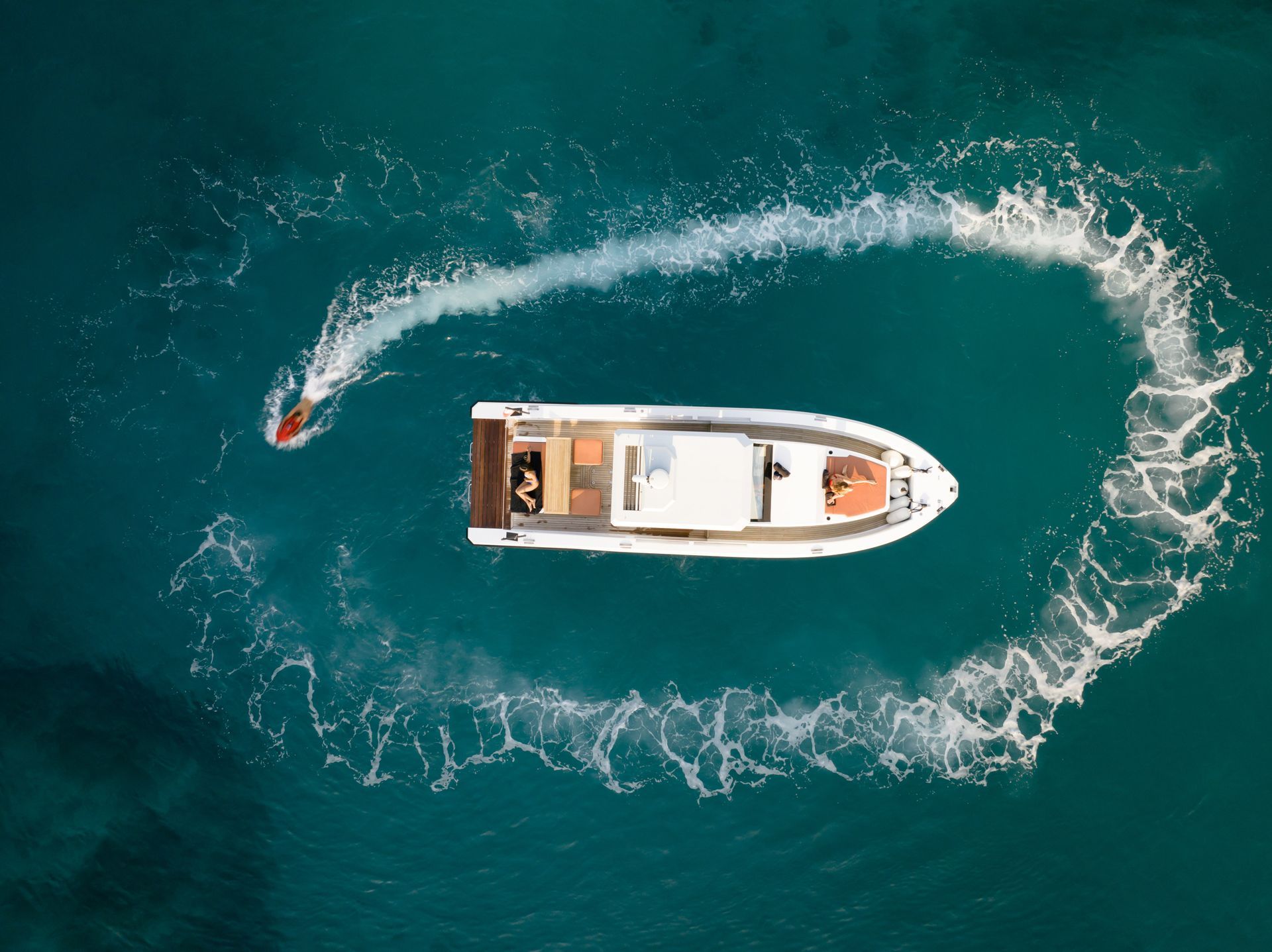 Private yacht charter in Rhodes,Greece with water sports on clear blue sea.