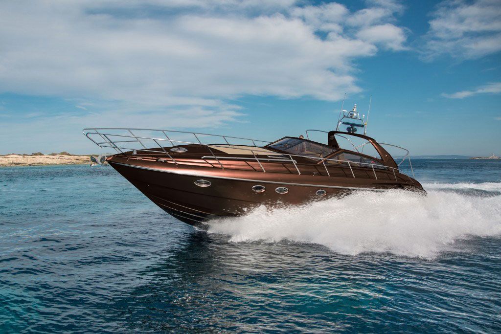 Princess V55 yacht cruising at speed for a luxury private charter in Mykonos