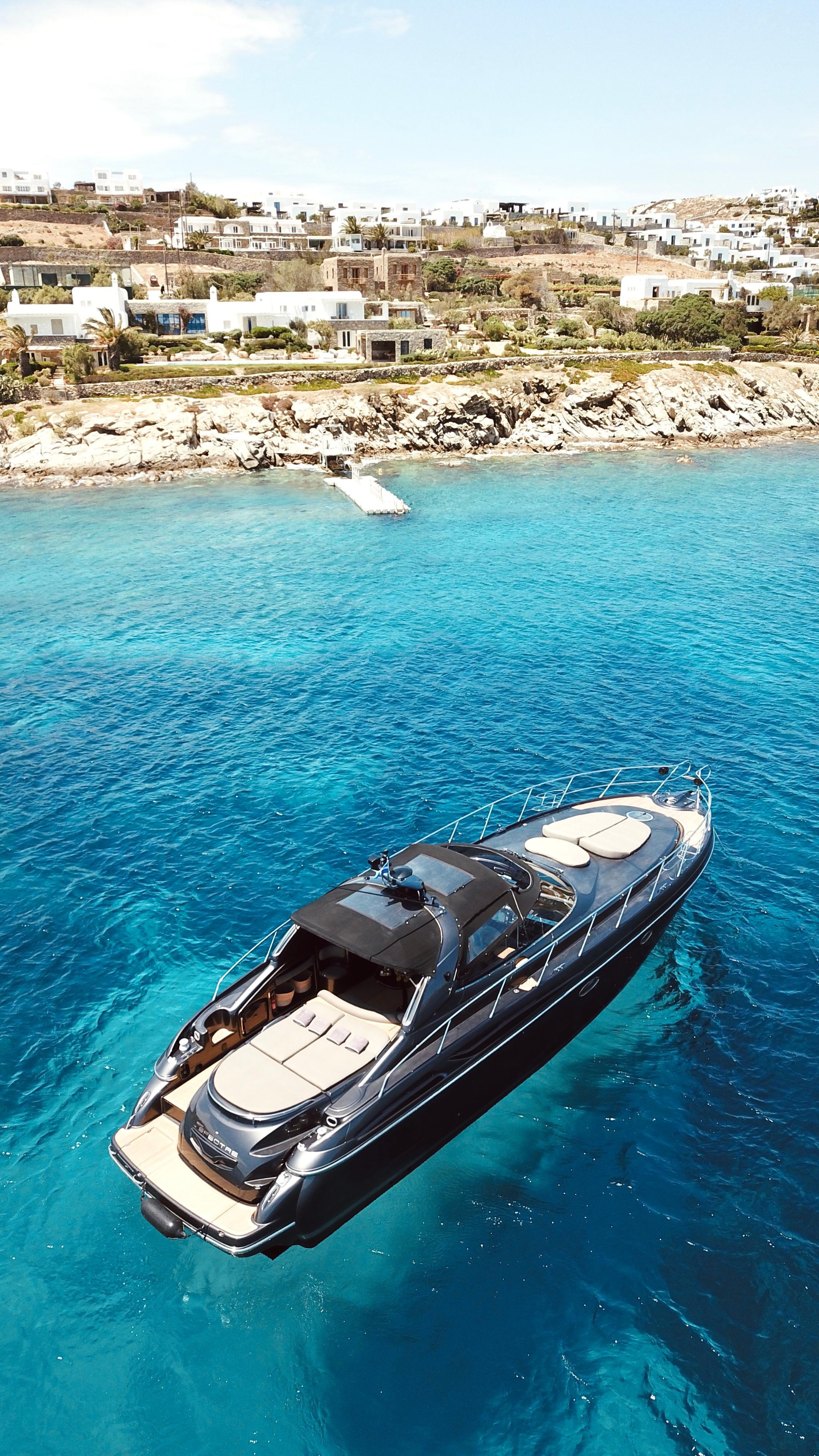 Private yacht charter along the Mykonos coastline in Greece