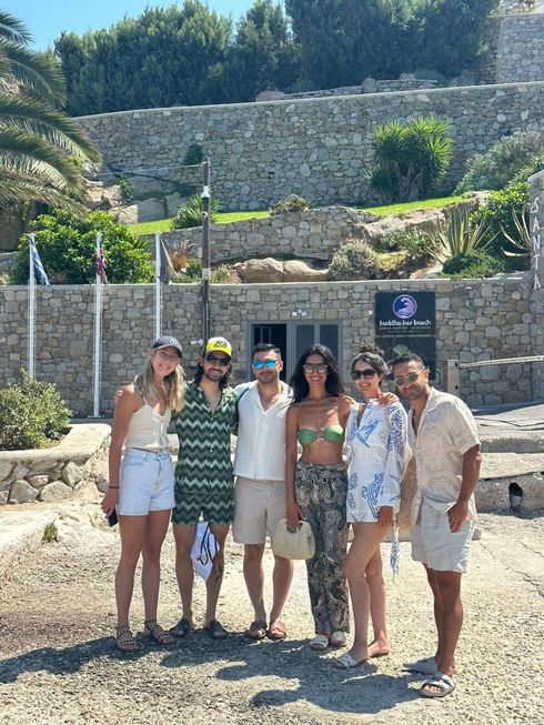 Aegean Yachting Charters host with guests in Ornos, Mykonos, before boarding a private or semi private yacht cruise