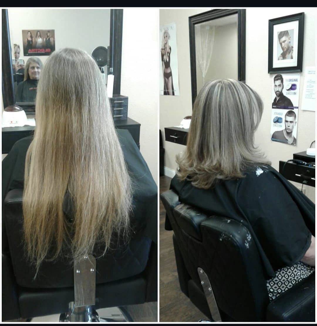 Side-by-side salon photos of long hair before and after a layered cut and gray highlights