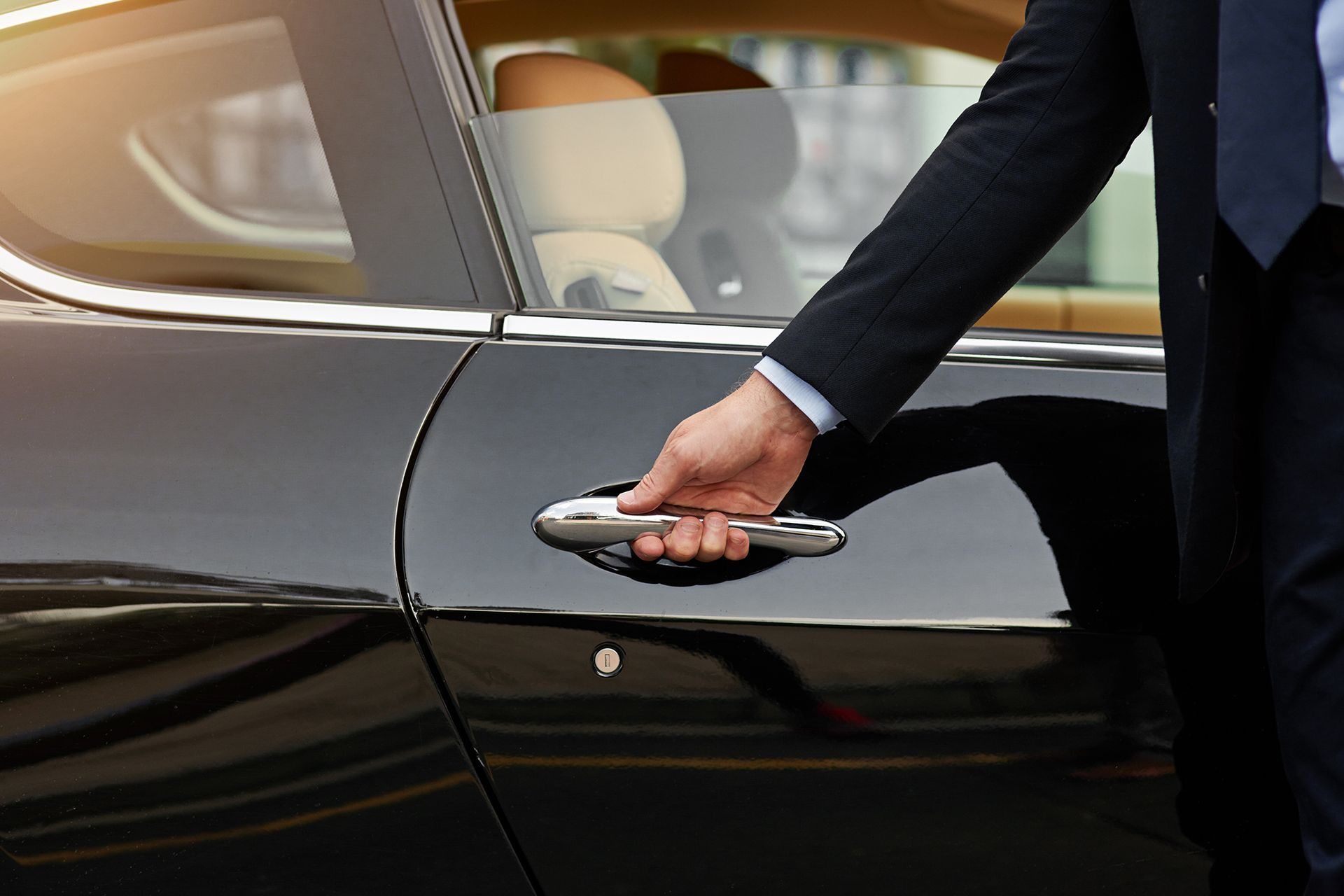 Person Holding Car Door