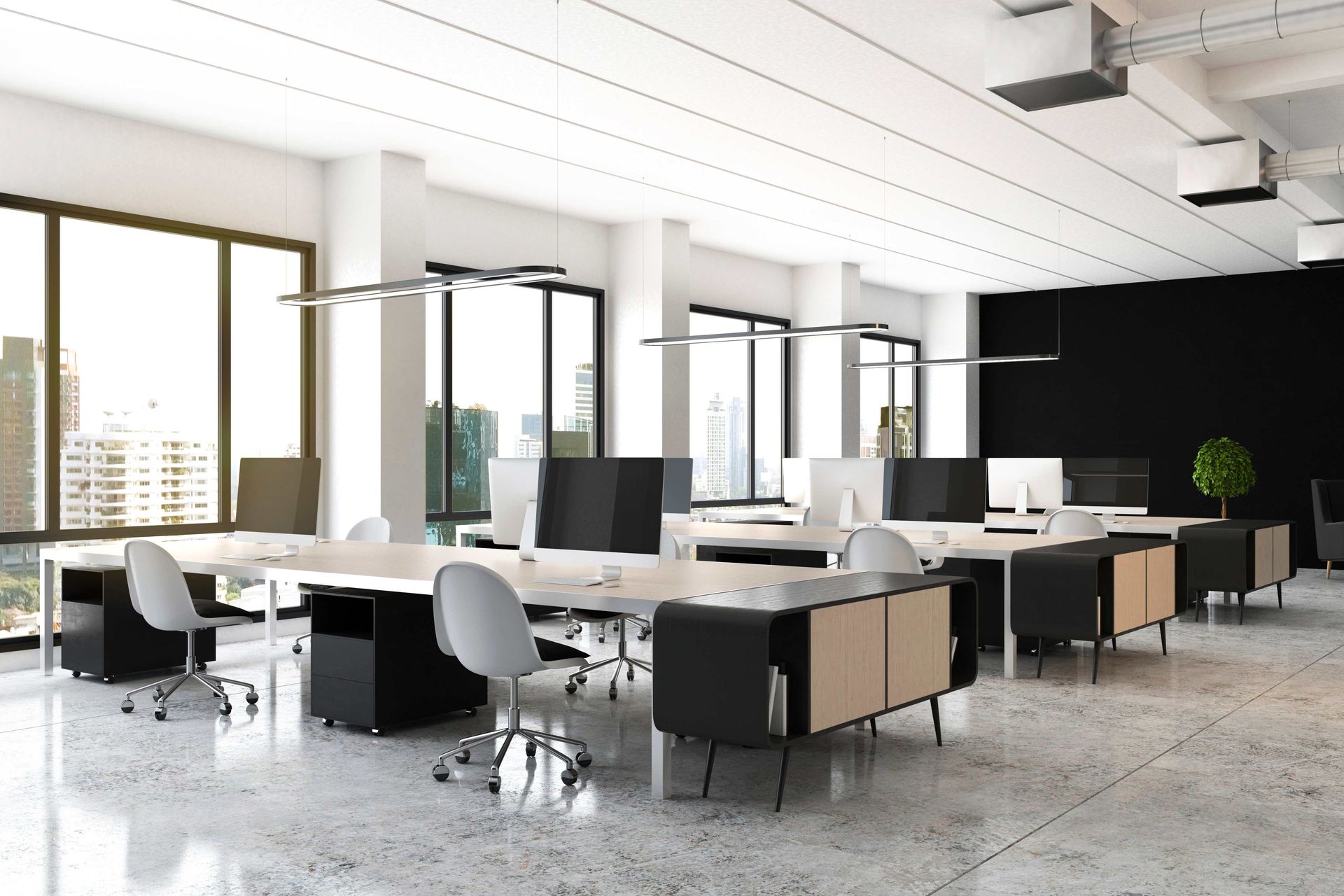 an empty office with a lot of windows and tables and chairs