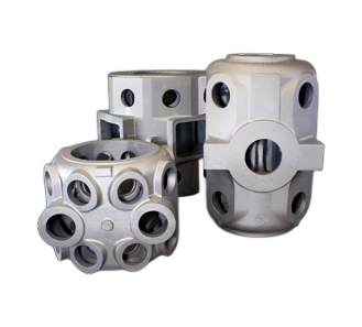 Three silver industrial metal couplings with round holes, arranged against a white background