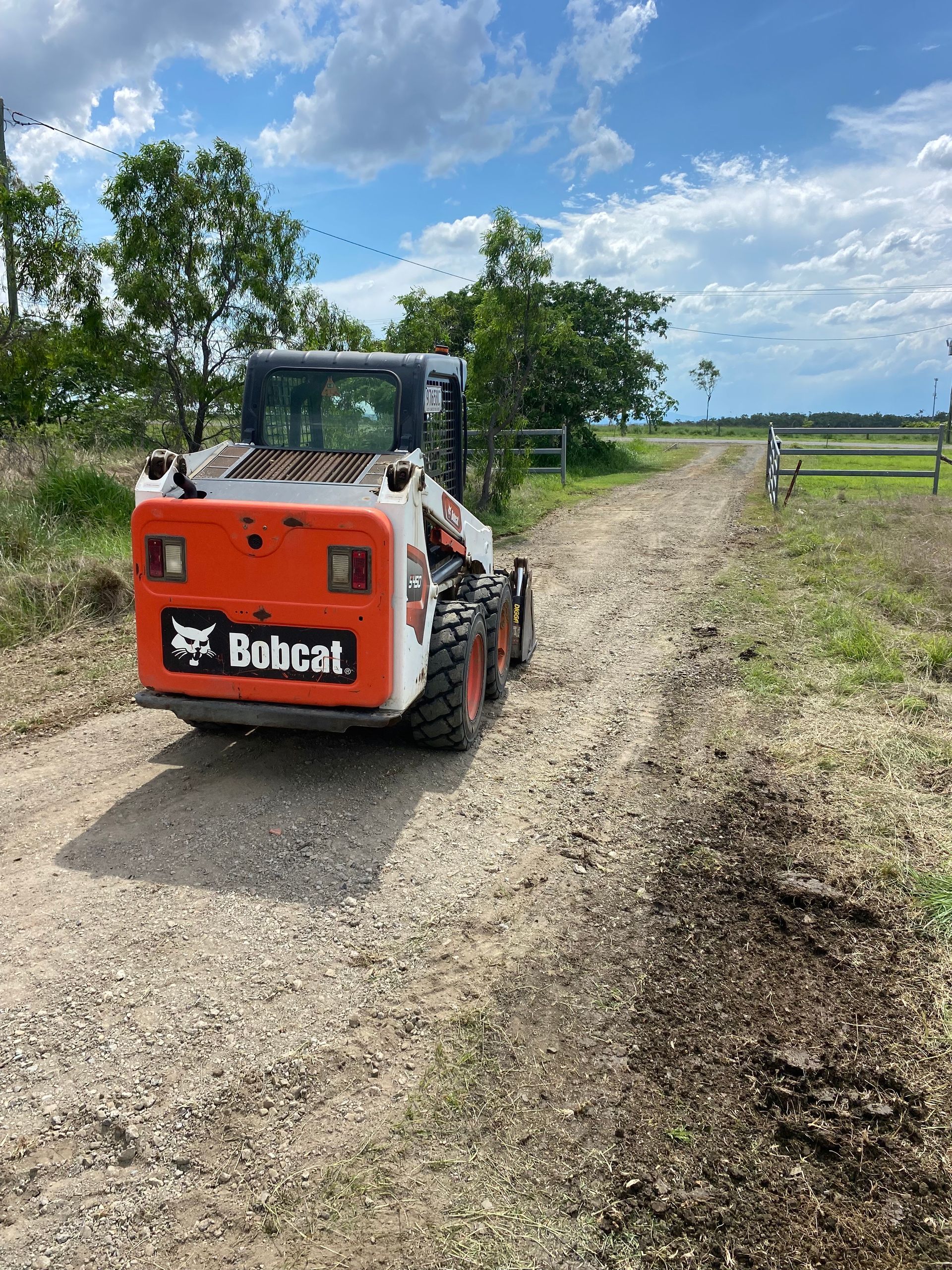 Yellow Front-End Loader on Dirt in An Overcast Setting — KAT Earthmoving In Nine Mile, QLD