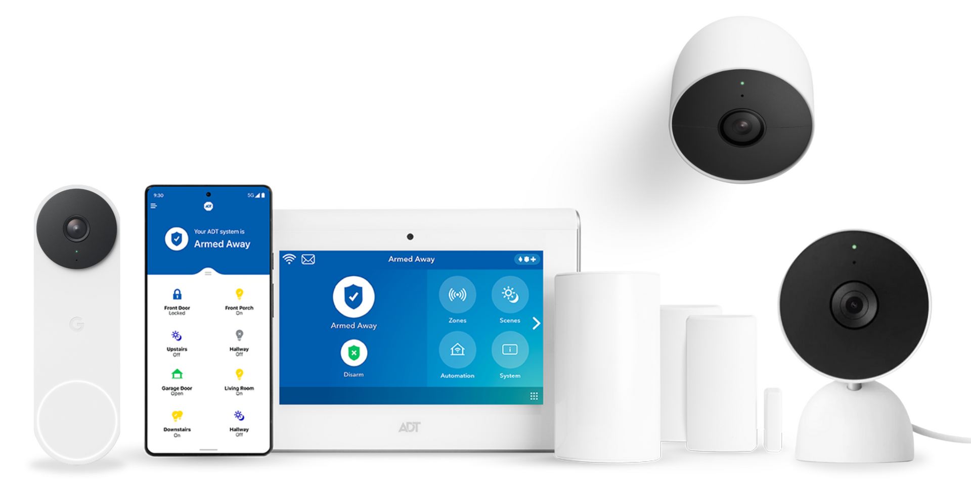 A phone a tablet a doorbell and a smoke detector are laying on a white surface.
