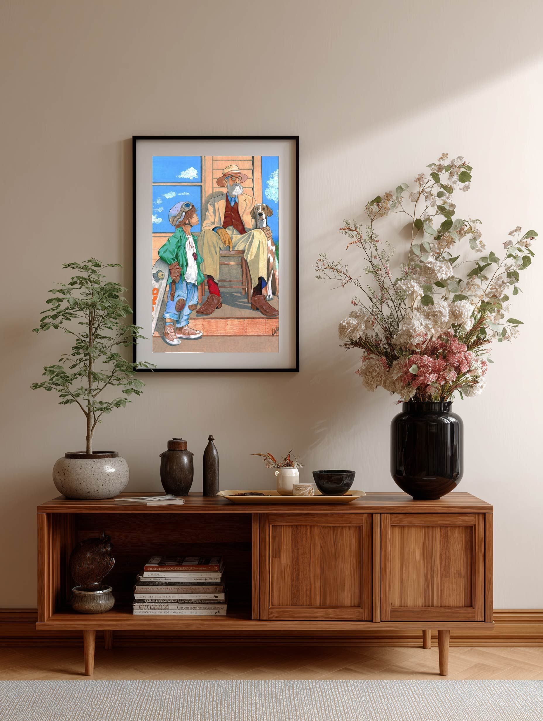 Minimalist living room with framed art above a wooden sideboard, potted plants, and decorative objects.