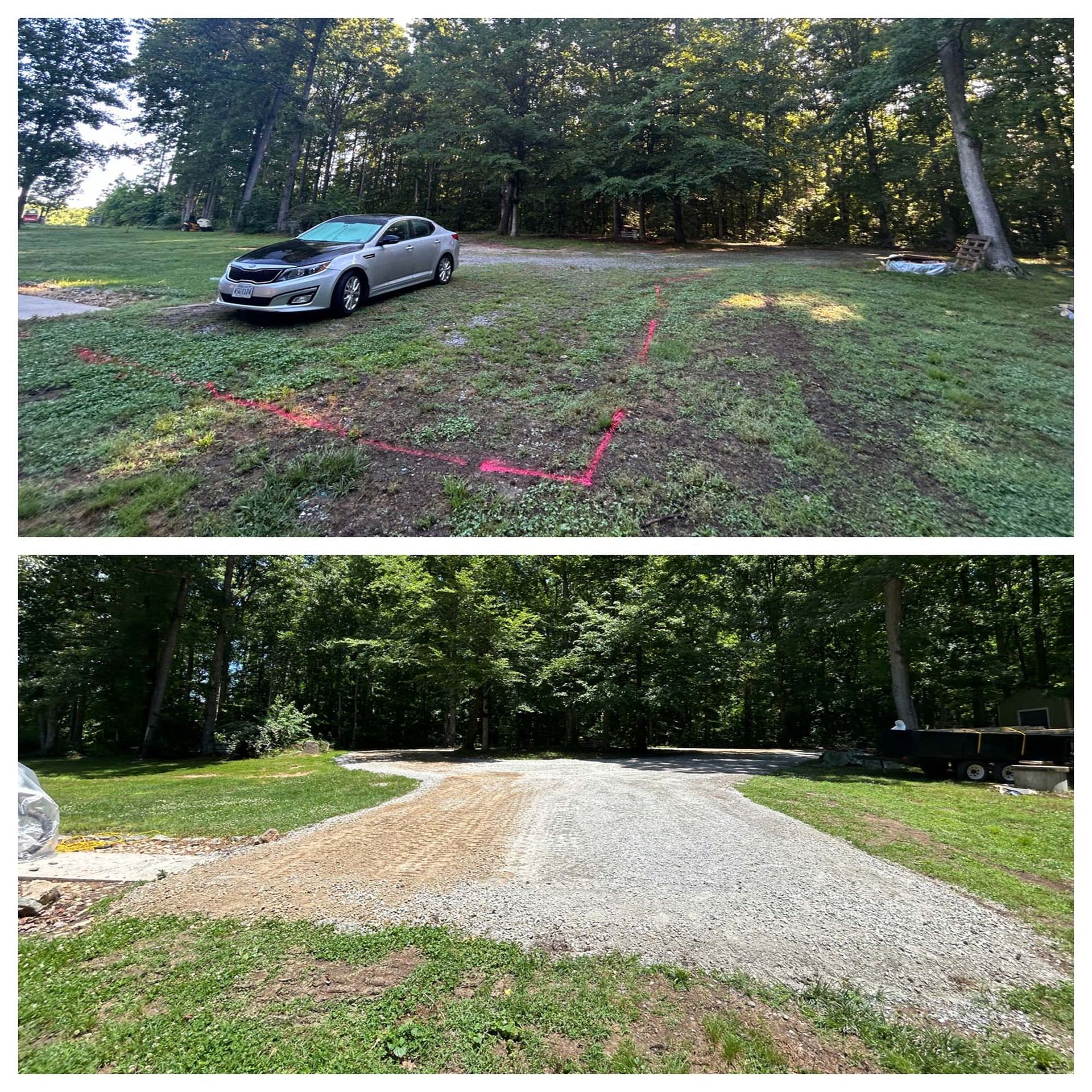A silver car parked on a grassy lot beside a newly laid gravel driveway at the edge of woods.