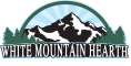 The logo for white mountain hearth shows a mountain and trees.