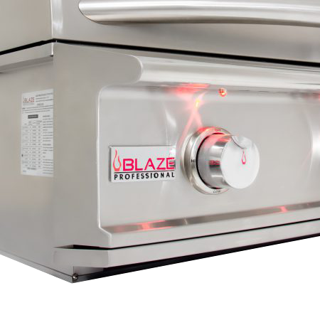 A close up of a blaze professional grill on a white background