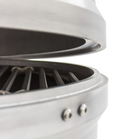 A close up of a stainless steel grill with the lid open
