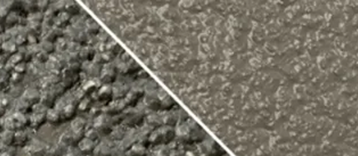 A close up of a concrete surface with a white line going through it.