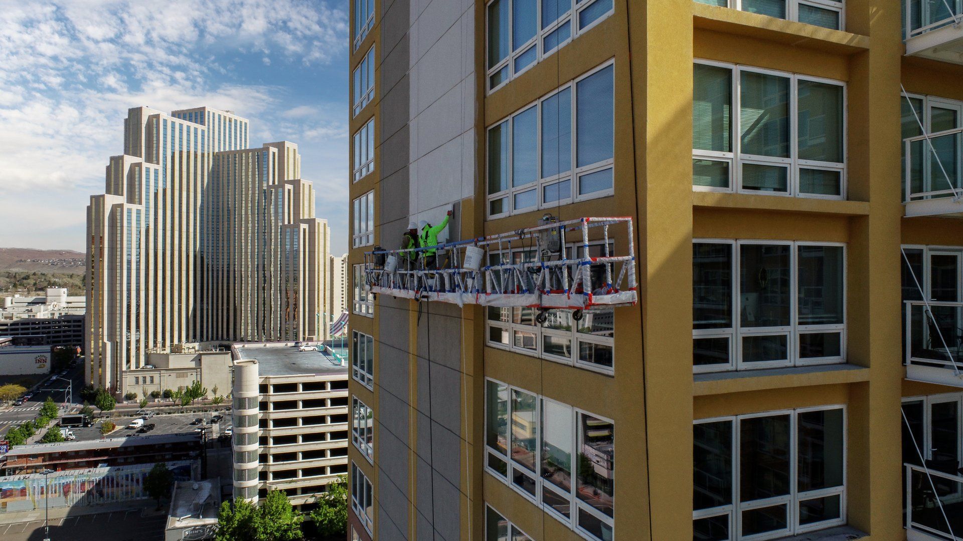 Swing stage on a Florida high-rise during structural repairs