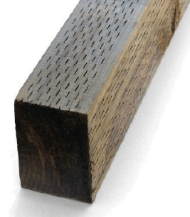 Dark brown, square wooden beam with angled, slit-like grooves on one side.