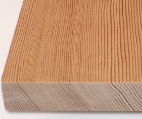Close-up of a wooden plank showing the grain patterns on the side and surface.