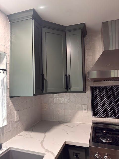 A large white closet with drawers and shelves in a living room.